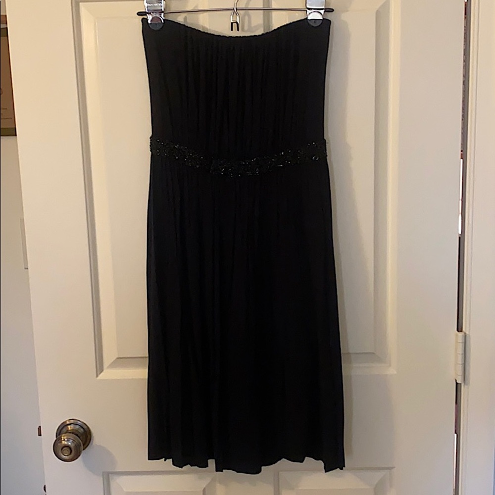 Strapless dress with beading.